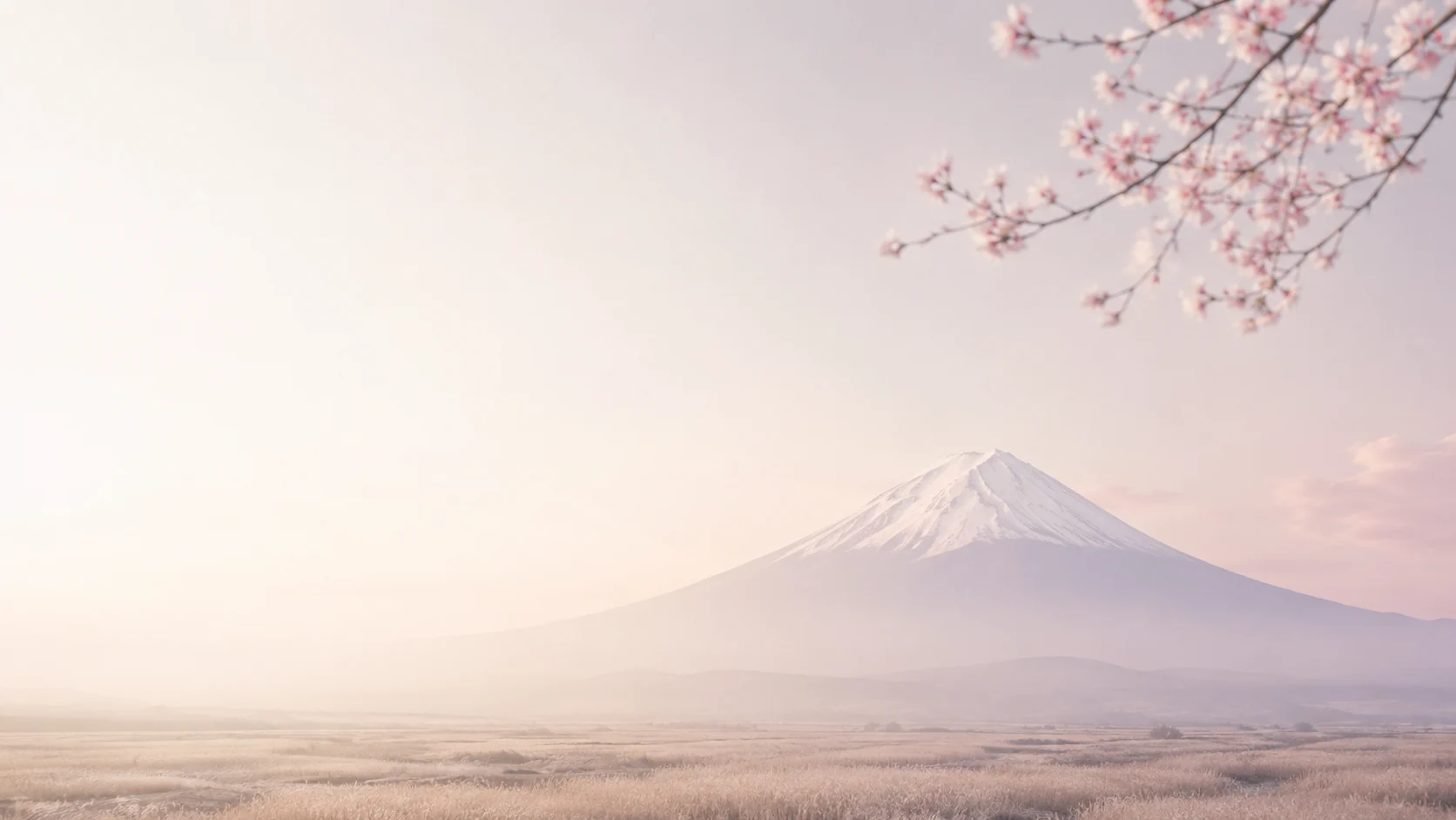 Monte Fuji ao longe numa manhã de neblina, com ramos de cerejeira em flor no canto superior direito